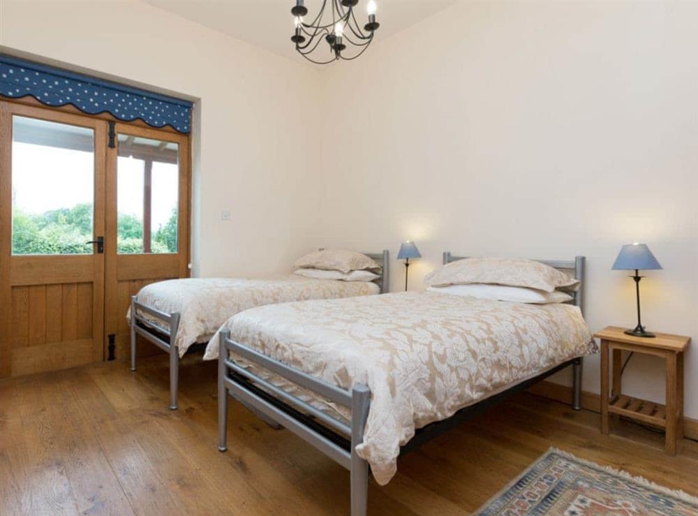 Comfortable twin bedroom at Parkers Lodge, 