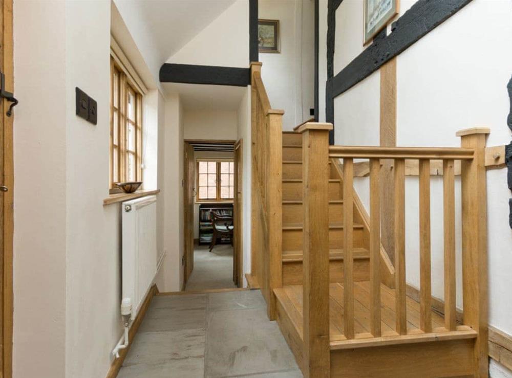 Hallway with stairs to upper level at Parkers, 