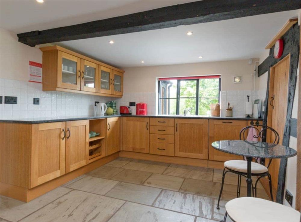 Well-equipped fitted kitchen with intimate dining/breakfast area at Parkers, 