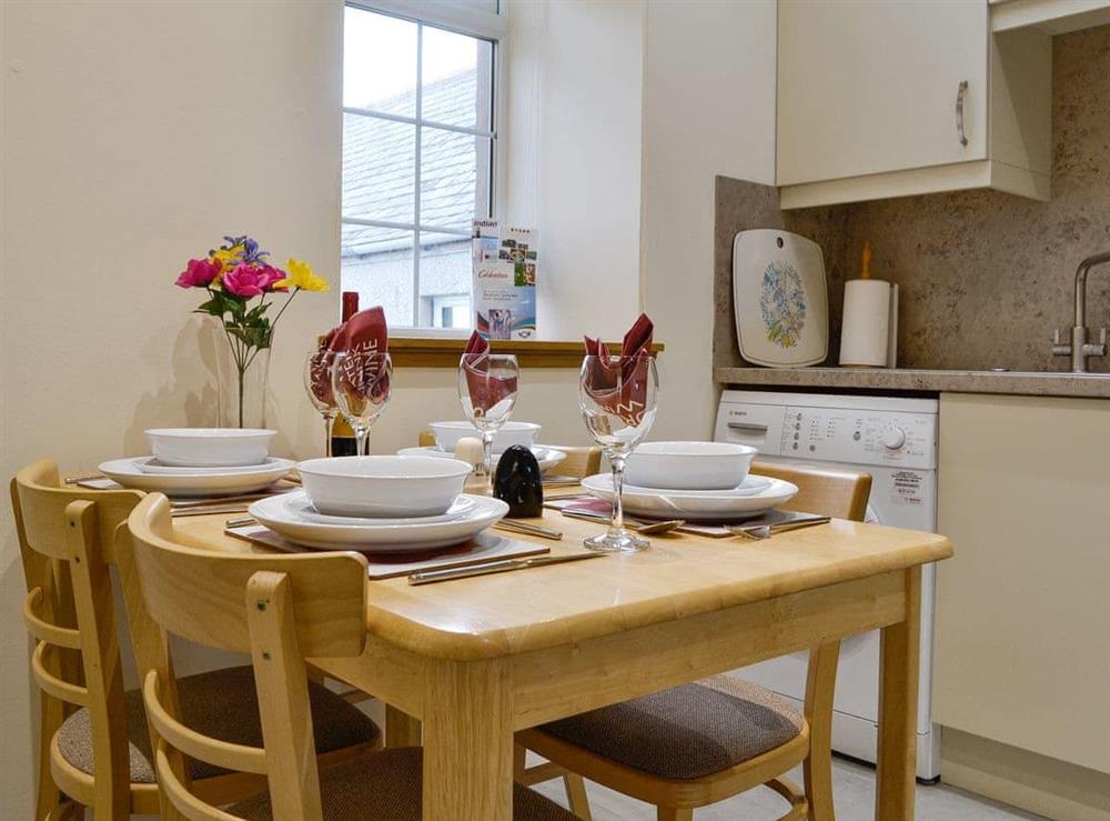Convenient dining area within kitchen at Mill Shore Cottage, 