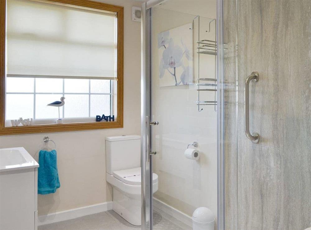 Light and airy shower room at Mill Shore Cottage, 