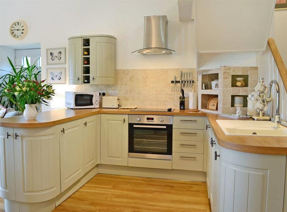 Immaculately presented kitchen area at Bridge Cottage, 