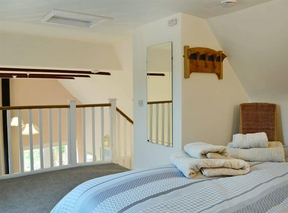 Spacious mezzanine bedroom double bedroom (photo 2) at Bridge Cottage, 