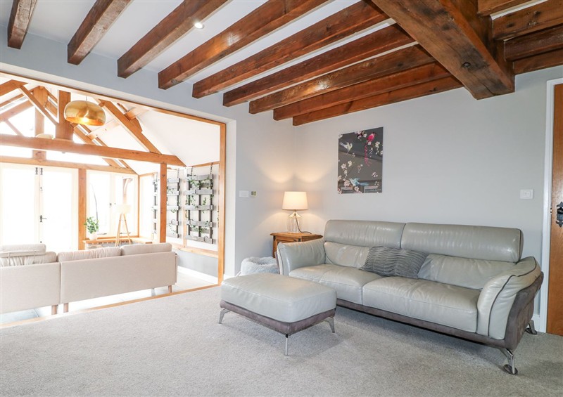 Relax in the living area at New Elms Farmhouse, Melbourne