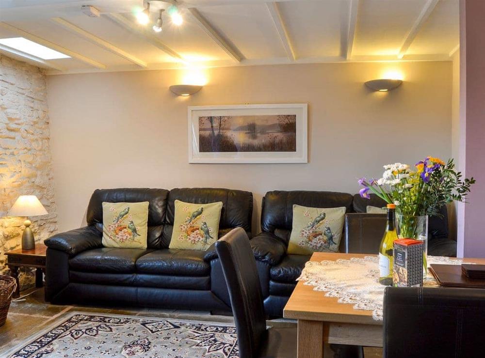 Tastefully furnished living area with original features at The Barn, 