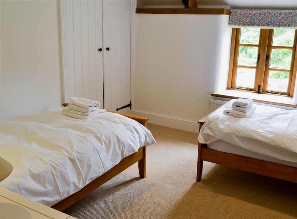 Twin bedroom at New Inn Farmhouse in Marnhull, near Shaftesbury, Dorset