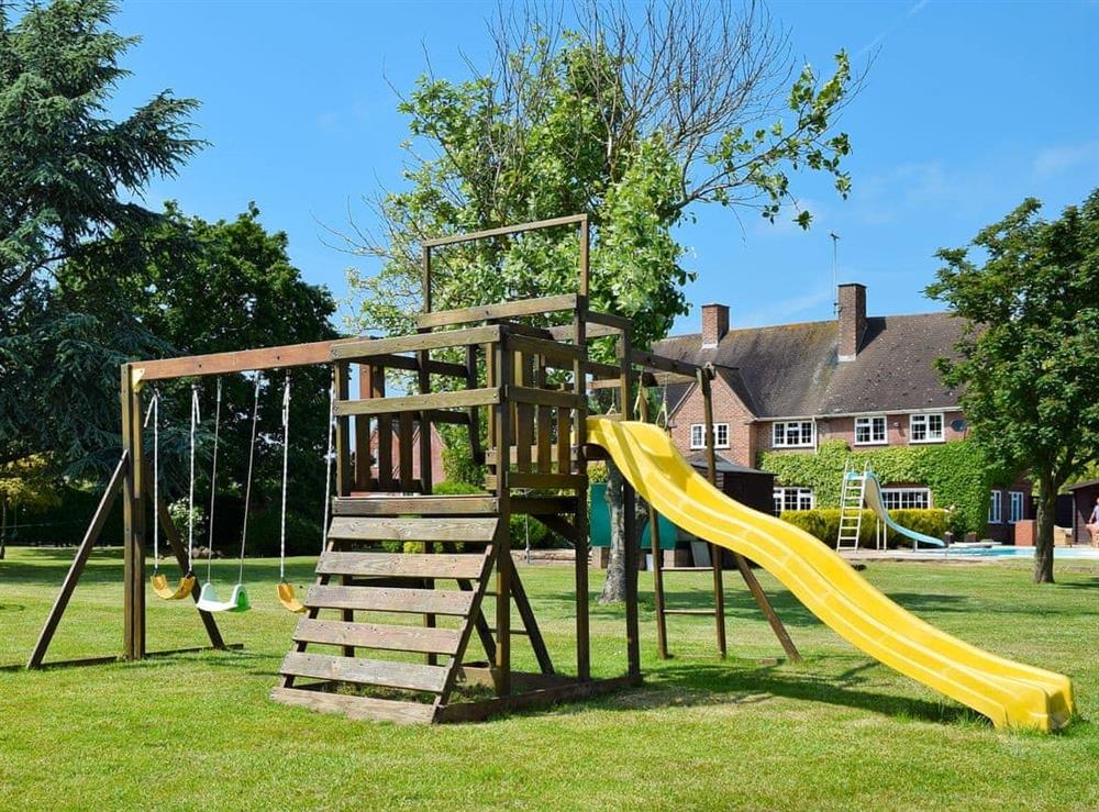 Children’s play area at New Inn House in Abbots Salford, Nr Stratford-upon-Avon, Worcs., Worcestershire