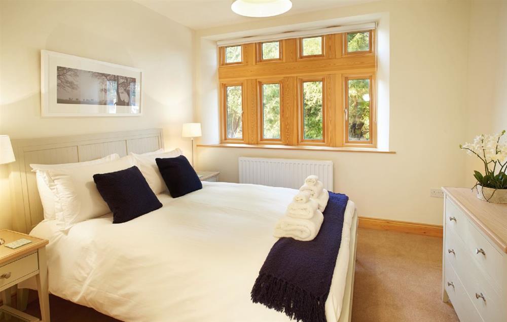 Double bedroom with 5’ bed at New Lodge, Watermillock