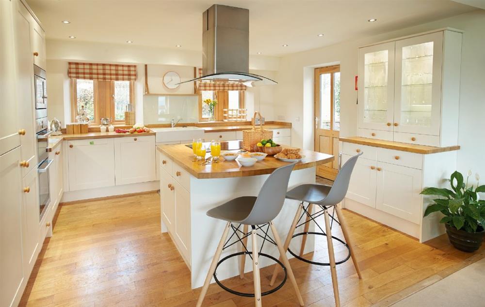 Open plan kitchen, dining and sitting area leading onto the balcony at New Lodge, Watermillock