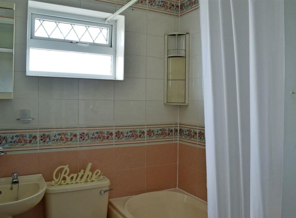 Bathroom with shower over bath at New Trend in Chapel St Leonards, near Skegness, Lincolnshire
