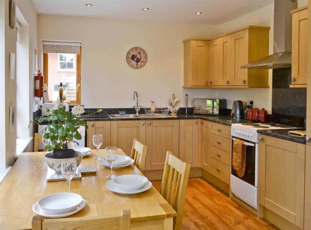 Open plan living/dining room/kitchen (photo 3) at Chestnut Cottage, 