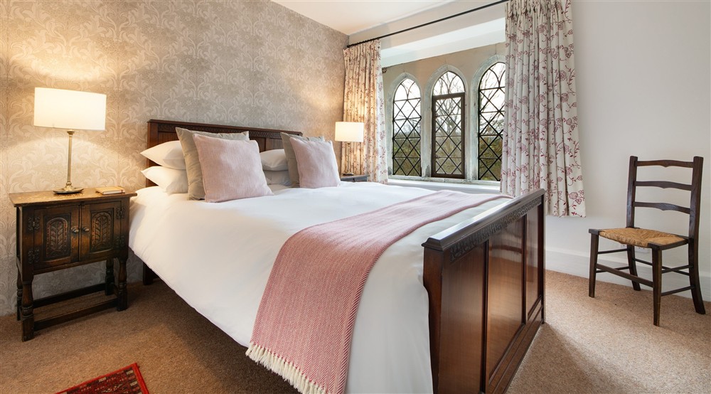One of the king-size bedrooms (photo 2) at Newark Lower Lodge in Wotton-under-edge, Gloucestershire