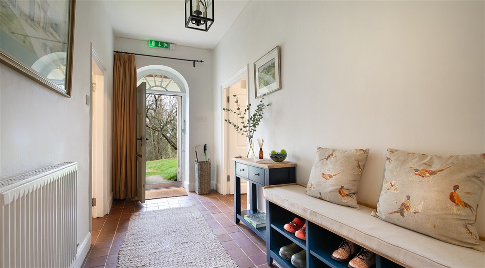 The entrance hall at Newark Lower Lodge in Wotton-under-edge, Gloucestershire