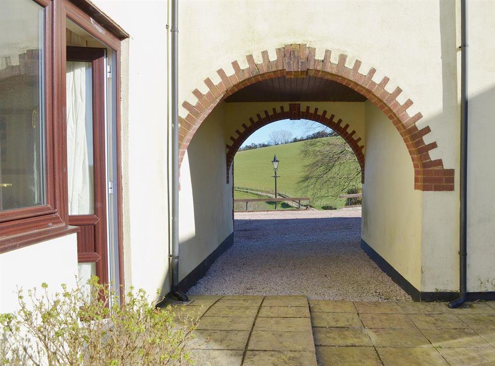 The adjoining buildings are separated by a stylish archway