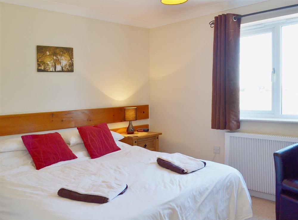 This double bedroom is both comfortable and welcoming at Anglers Rest, 