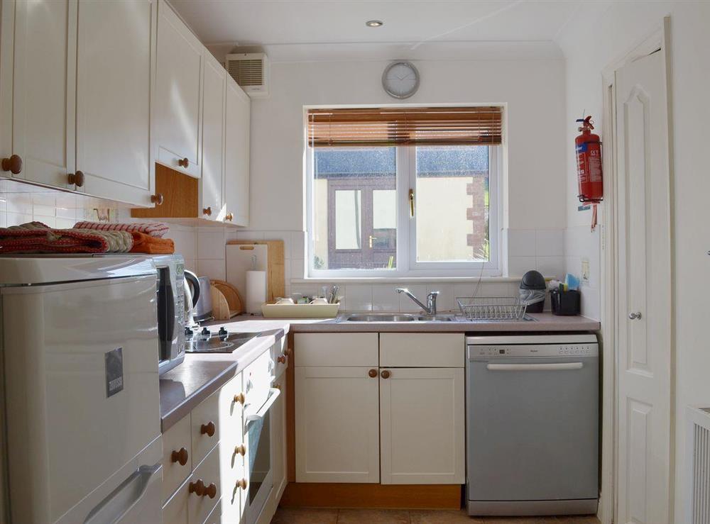 The well-equipped galley-style kitchen at Dartmoor View, 