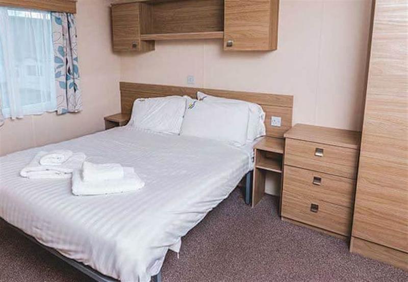 Bedroom in the Comfort Plus Caravan 2 at Newquay Bay Resort in Newquay, Cornwall