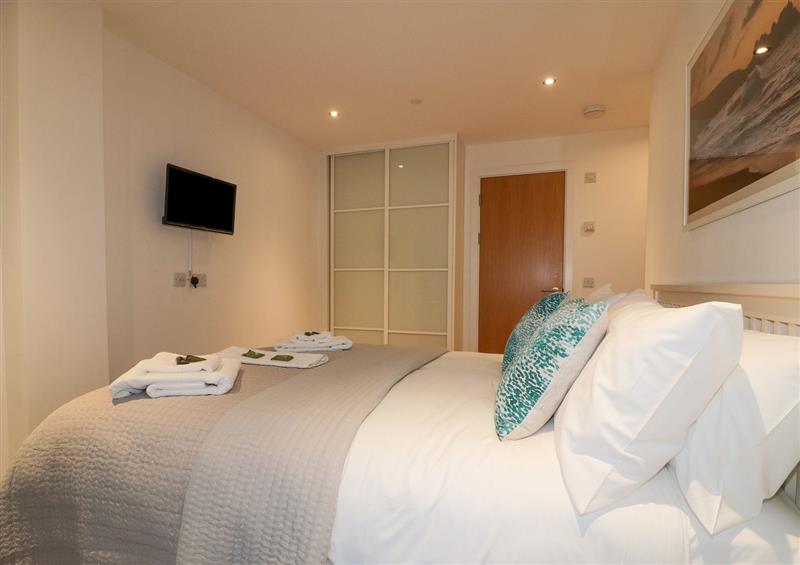 One of the bedrooms at Newquay Fistral Beach View, Newquay