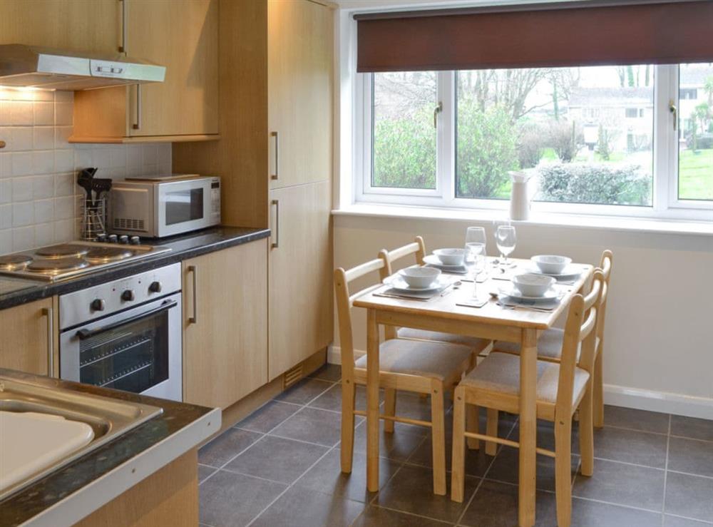 Well-equipped kitchen with dining area at Newquay Holiday Villa in Newquay, Cornwall