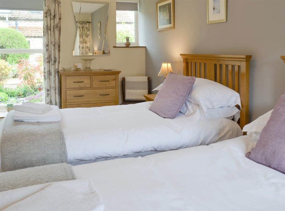 Good-sized twin bedroom at Newstead Cottage in Thornton-le-Dale, near Pickering, North Yorkshire