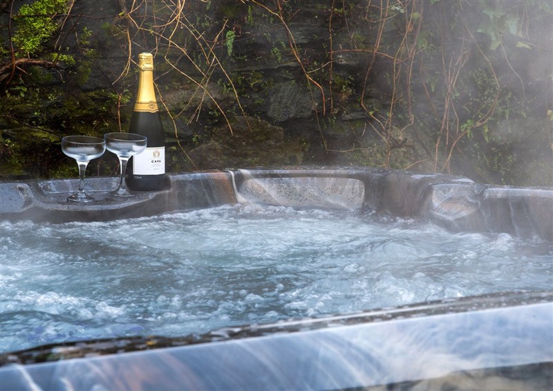 Relax in the hot tub at Newton Hall, Inveraray