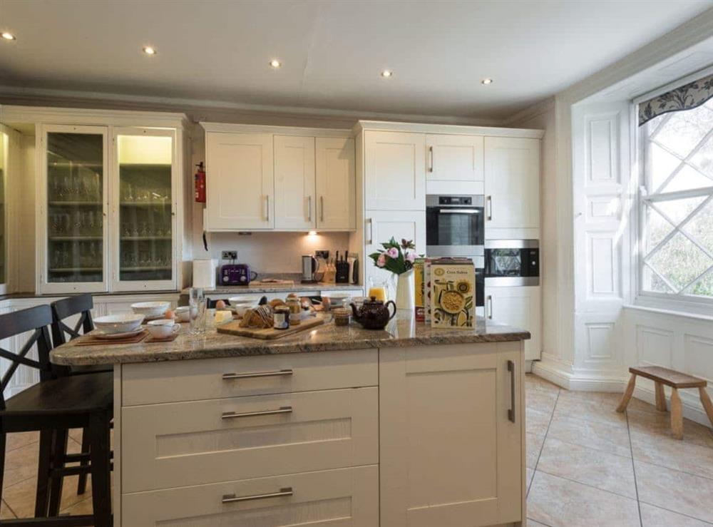 Well equipped kitchen with breakfast area at Newton Manor House in Swanage, Isle of Purbeck, Dorset., Great Britain