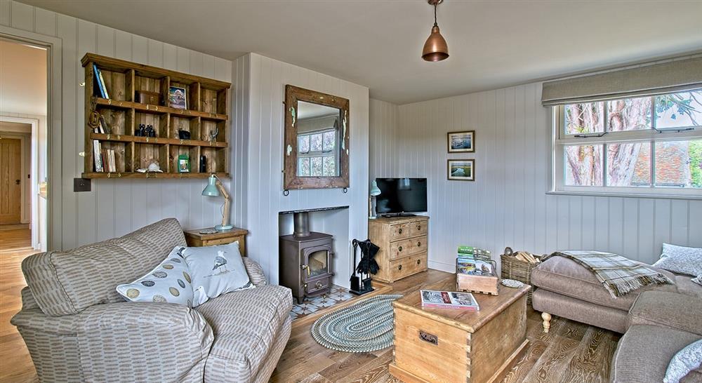 The sitting room at Newtown Cabin in Newtown, Isle Of Wight