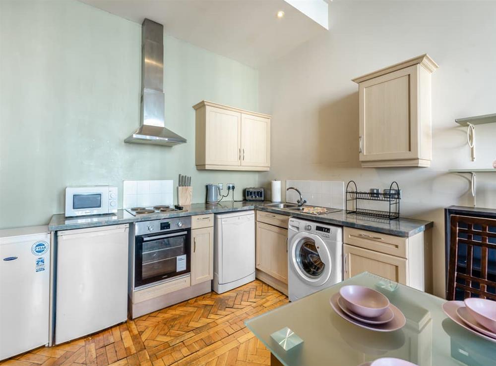 Kitchen area (photo 3) at Nizwa Apartment in Liverpool, Merseyside