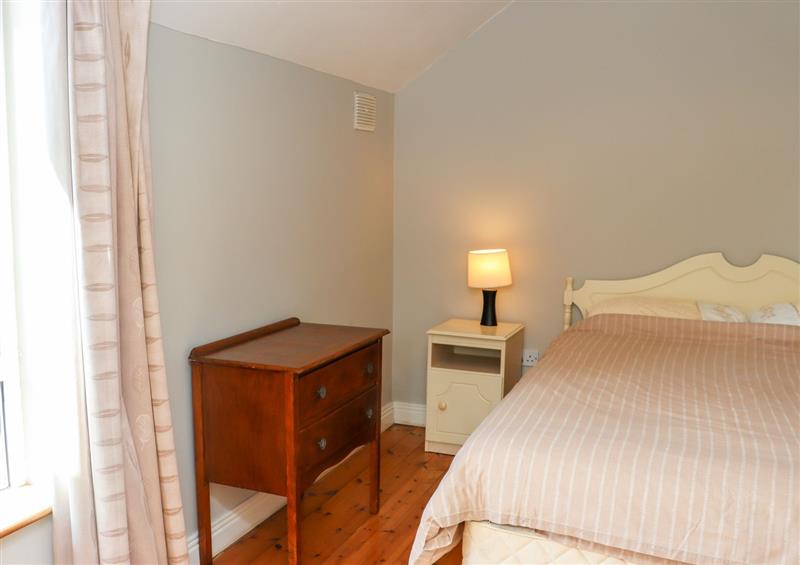 This is a bedroom at No. 1 Mariners Court, Rosslare Strand