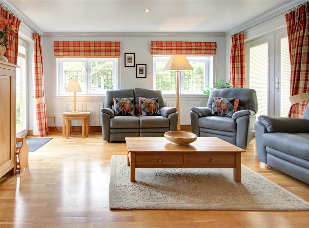 Living room at No. 1 The Links Apartments in Brora, Sutherland