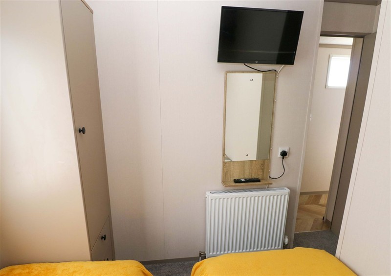 A bedroom in No 13 Broadfield Farm Holiday Park at No 13 Broadfield Farm Holiday Park, Broadfield near New Hedges