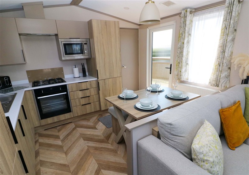 The living room at No 13 Broadfield Farm Holiday Park, Broadfield near New Hedges