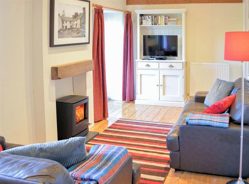Warm and welcoming living room at No. 2 Benar in Penmachno, near Betws-y-Coed, Gwynedd