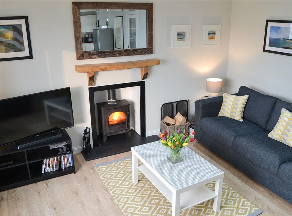 Lounge area with wood burner at No. 3 in Marvig, Isle of Lewis, Outer Hebrides, Scotland