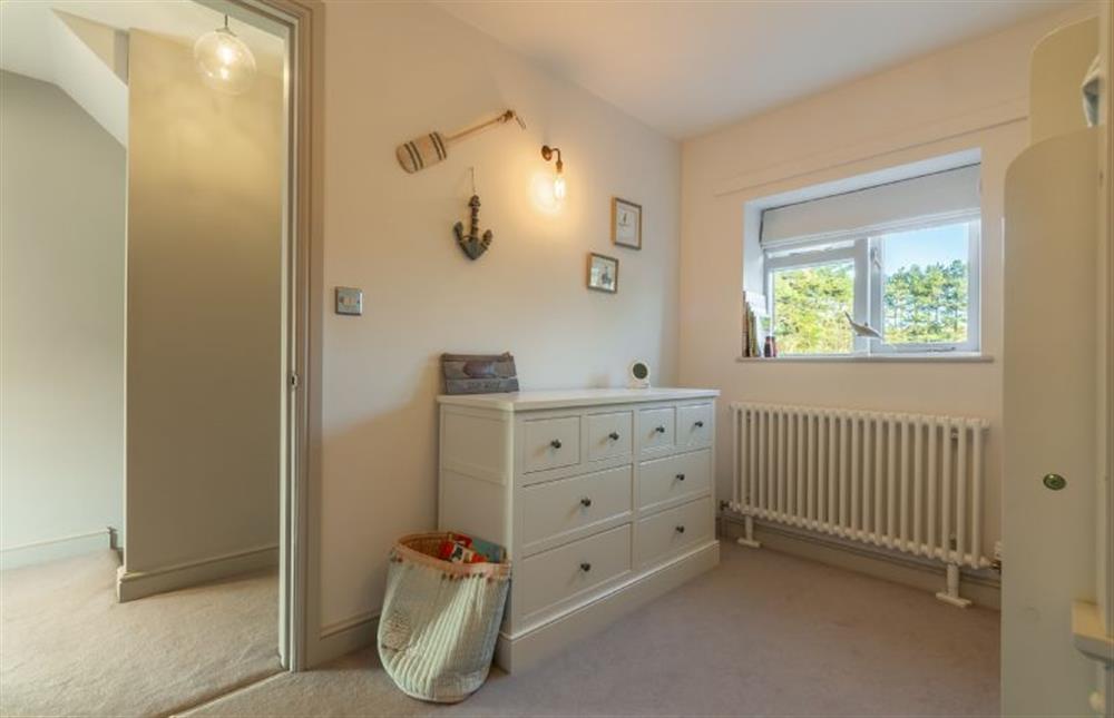 First floor: Bedroom three storage at No. 3 Sutherland Cottages, Brancaster near Kings Lynn