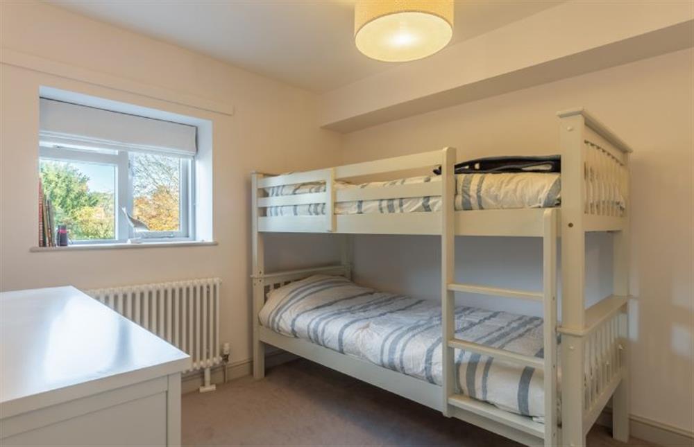 First floor: Bedroom three with full-size bunk beds at No. 3 Sutherland Cottages, Brancaster near Kings Lynn
