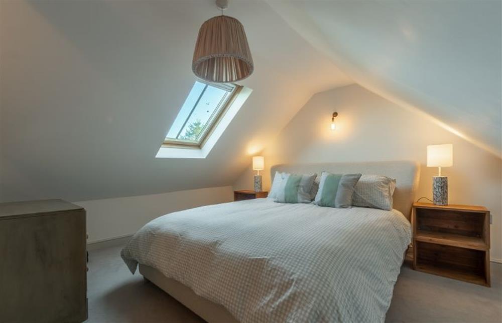 First floor: Master bedroom at No. 3 Sutherland Cottages, Brancaster near Kings Lynn
