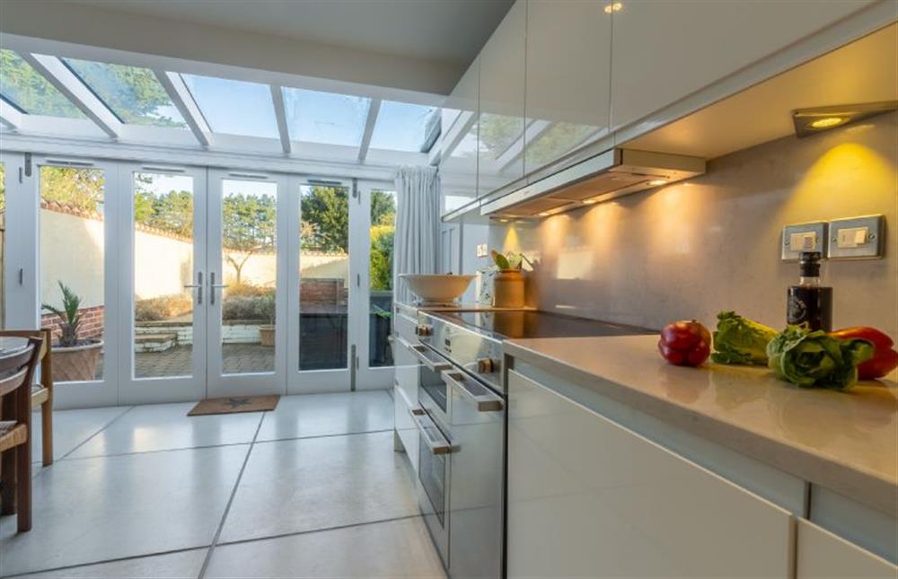 Ground floor: Kitchen view to the garden at No. 3 Sutherland Cottages, Brancaster near Kings Lynn