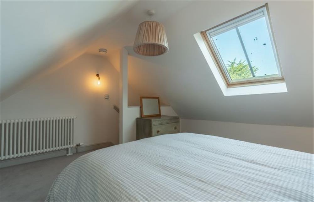 Second floor: The master bedroom has restricted ceiling height at No. 3 Sutherland Cottages, Brancaster near Kings Lynn