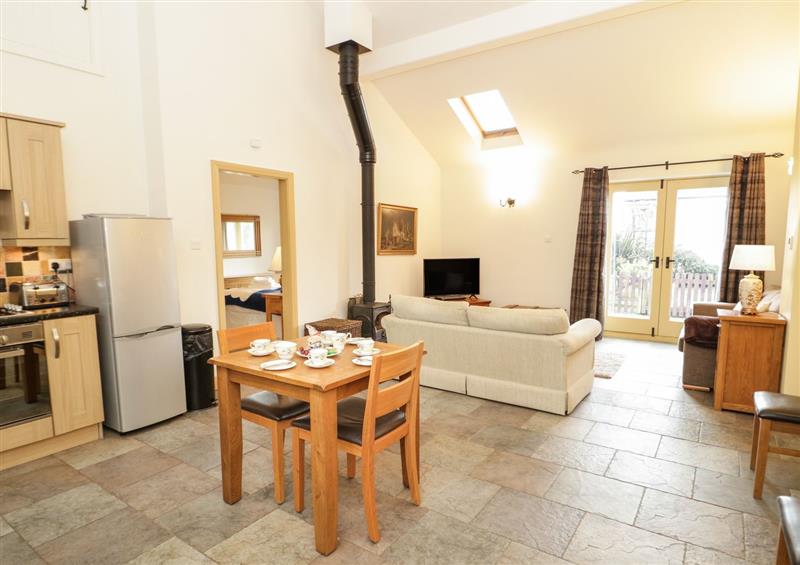 Relax in the living area at No 3 The Dairy, Capel Coch near Llannerch-Y-Medd