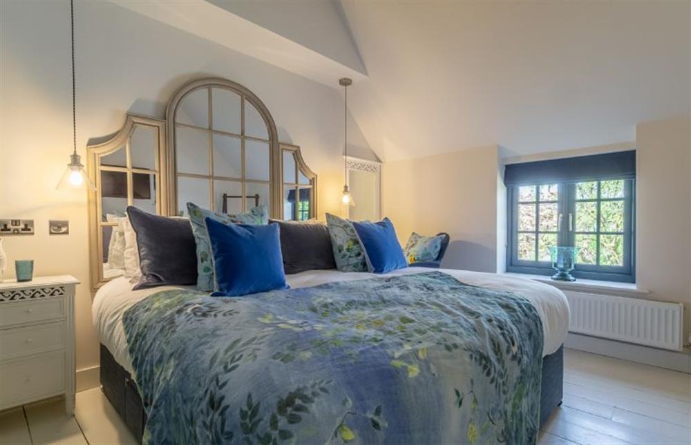 First floor: Very elegant super-king size bed at No. 33 Cottage 2, Thornham near Hunstanton