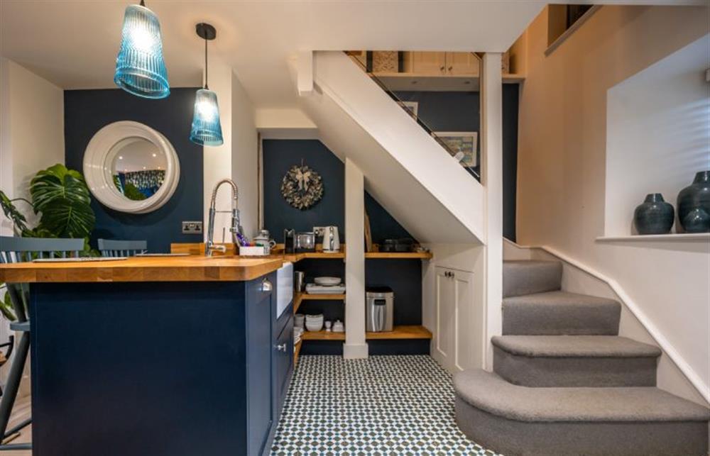 Ground floor: Modern stylish kitchen area and stairs at No. 33 Cottage 2, Thornham near Hunstanton