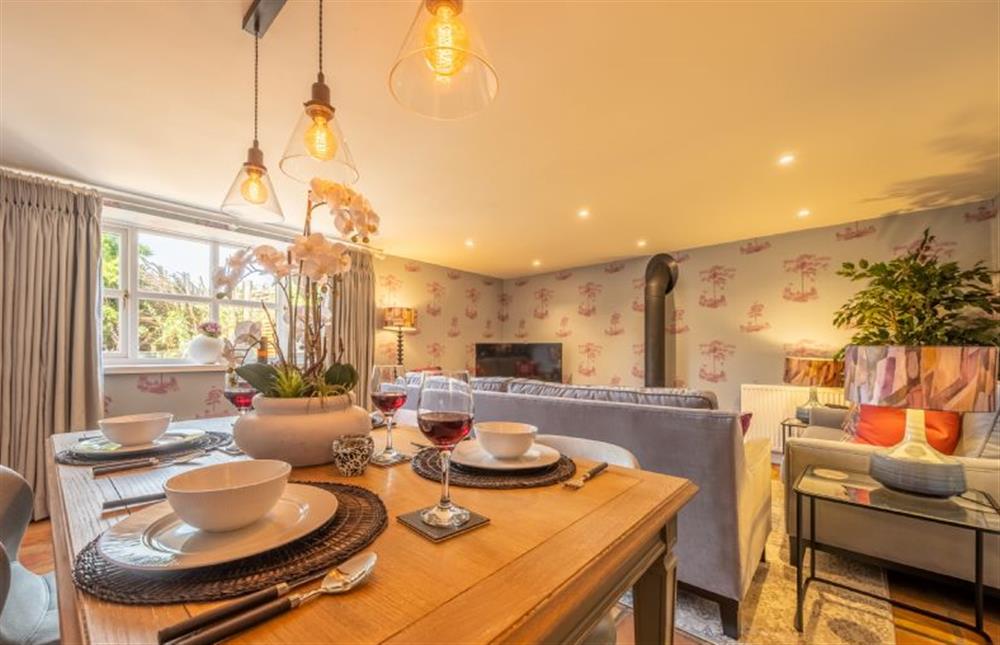 Ground floor: The dining table has seating for six at No. 33 Woodlands Cottage, Heacham near Kings Lynn