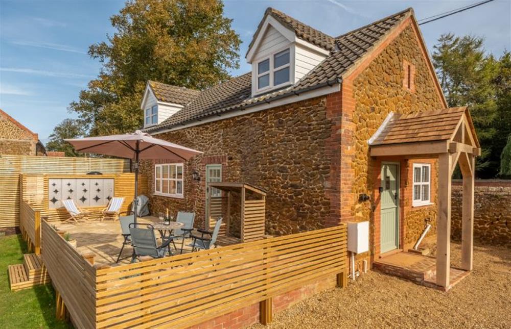 The decking and cottage at No. 33 Woodlands Cottage, Heacham near Kings Lynn
