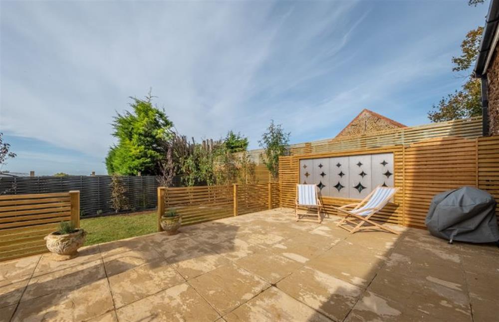 The decking and the garden at No. 33 Woodlands Cottage, Heacham near Kings Lynn