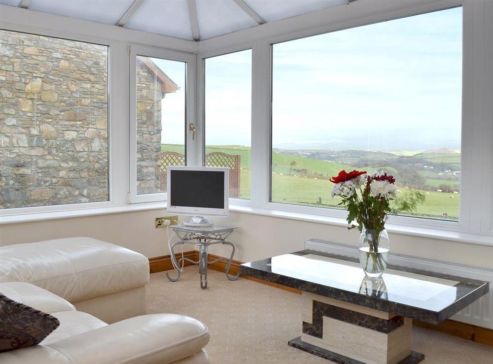 Lovely conservatory with far reaching views at No 4 Pengraig Draw in Aberystwyth, Dyfed
