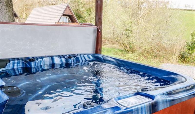 Relax in the hot tub at No 51 Valley Lodges, Honicombe Manor near Gunnislake