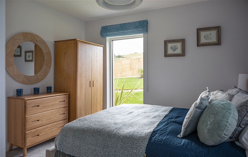 One of the bedrooms (photo 2) at