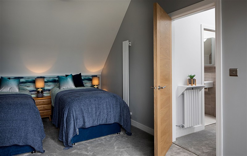 This is a bedroom (photo 2) at