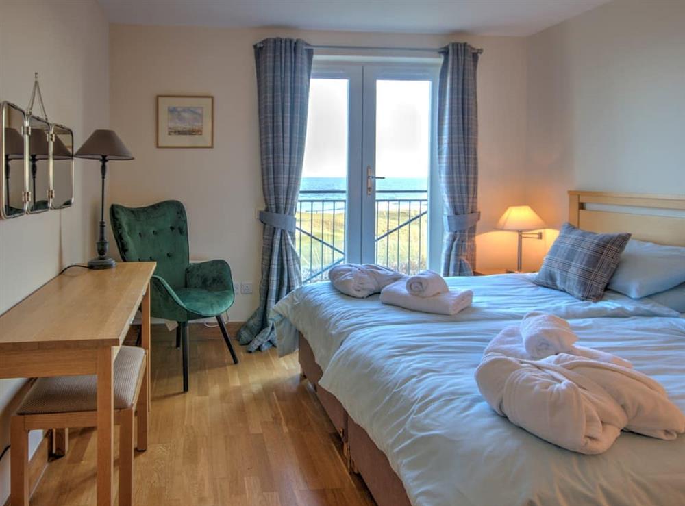Double bedroom at No.10 The Links Apartments in Brora, Sutherland